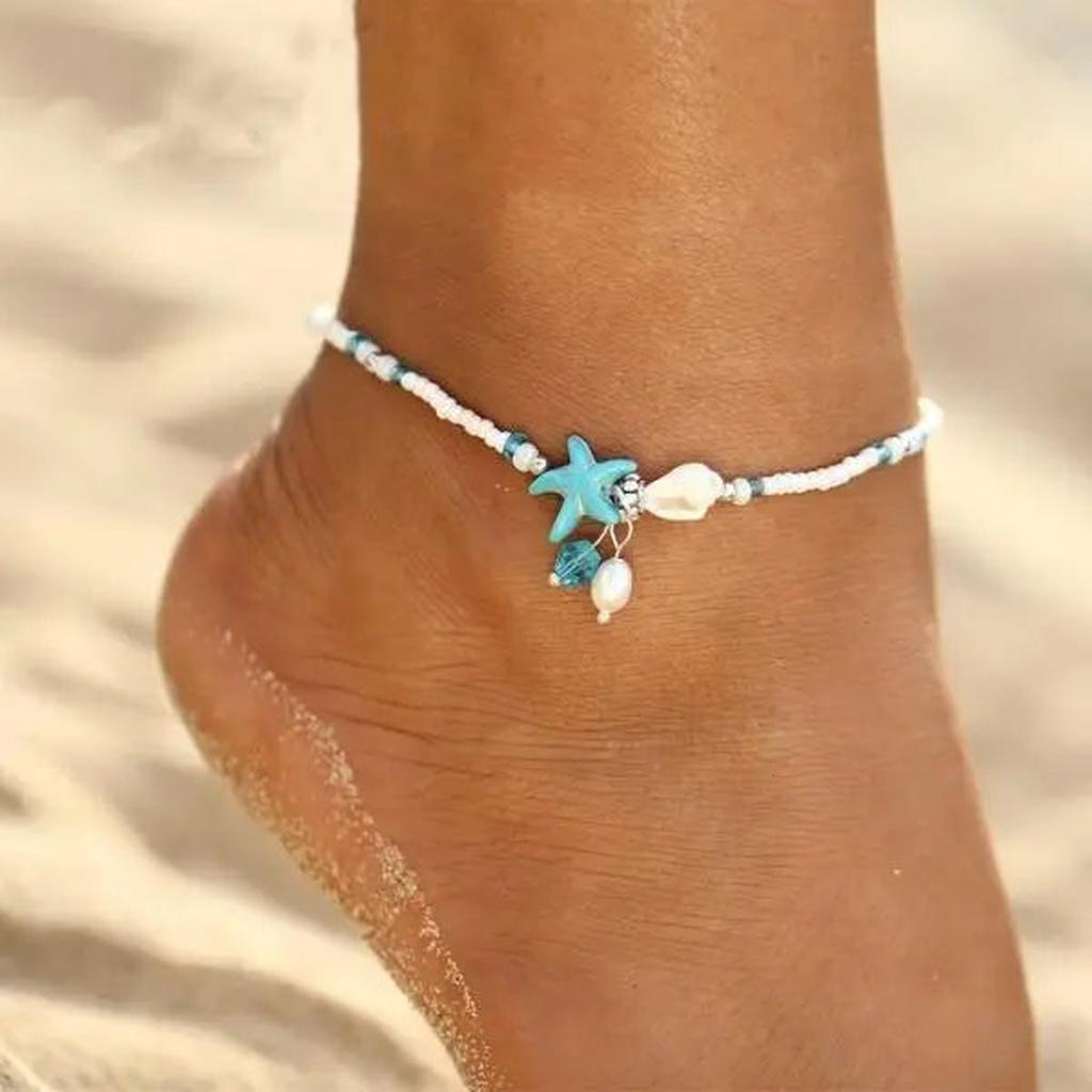 Armband mit Sternen, Muscheln und Natursteinen