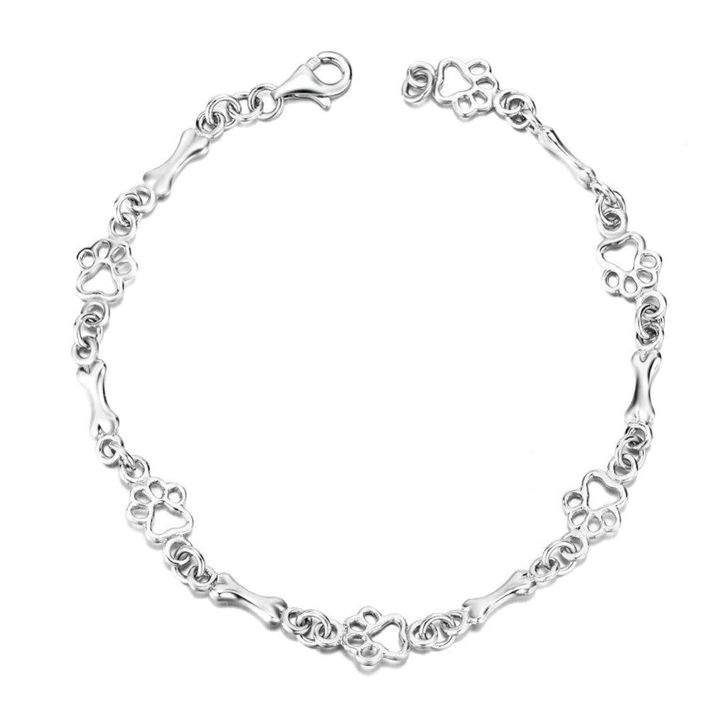 Armband mit Hundepfoten- und Knochen-Anhängern in Weißgold
