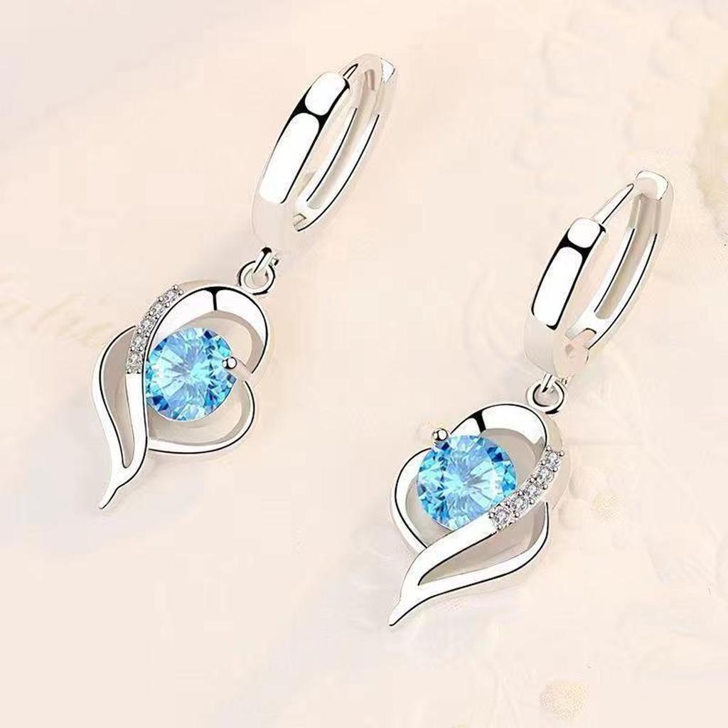 Eclipse — Boucles d’oreilles pendantes cœur argentées