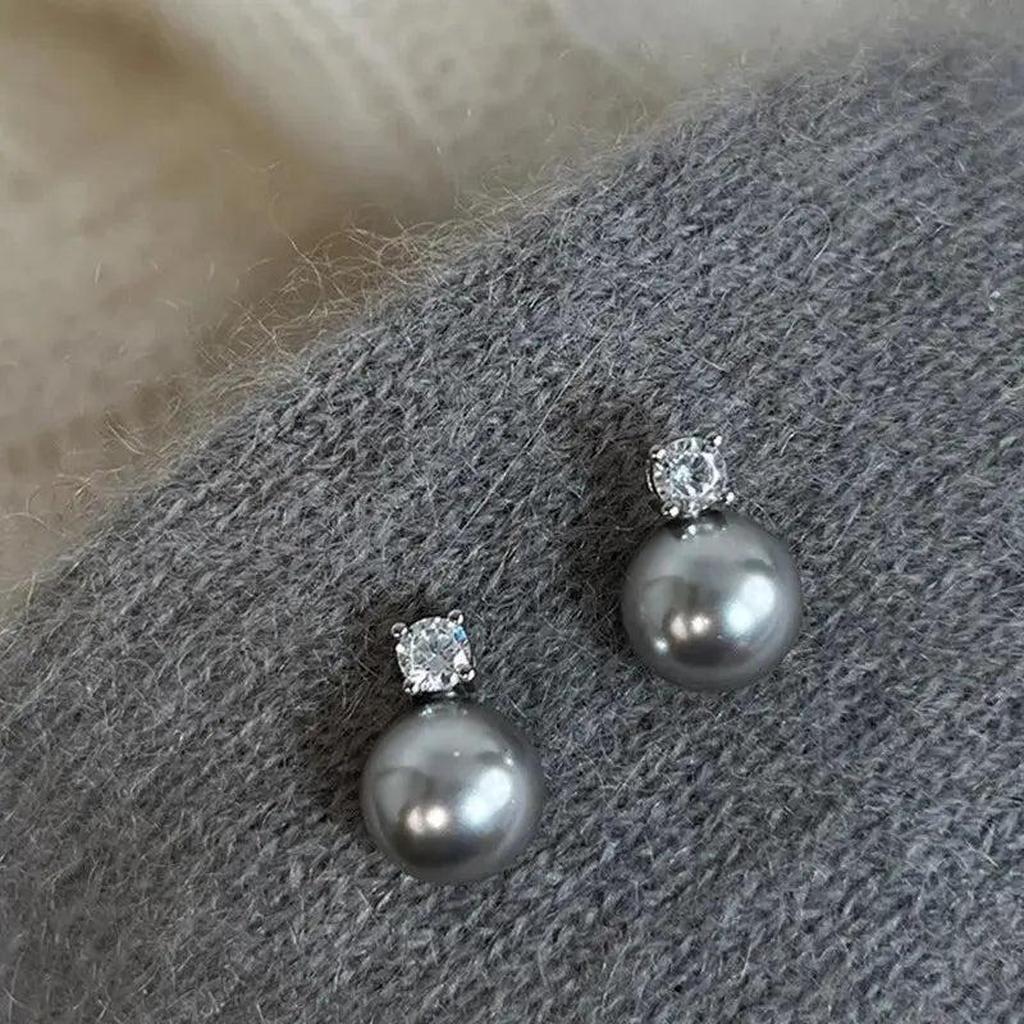 Boucles d’oreilles élégantes à perle noire et zircons