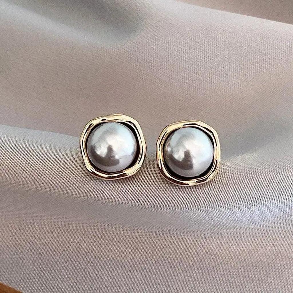 Boucles d’oreilles élégantes à perle noire