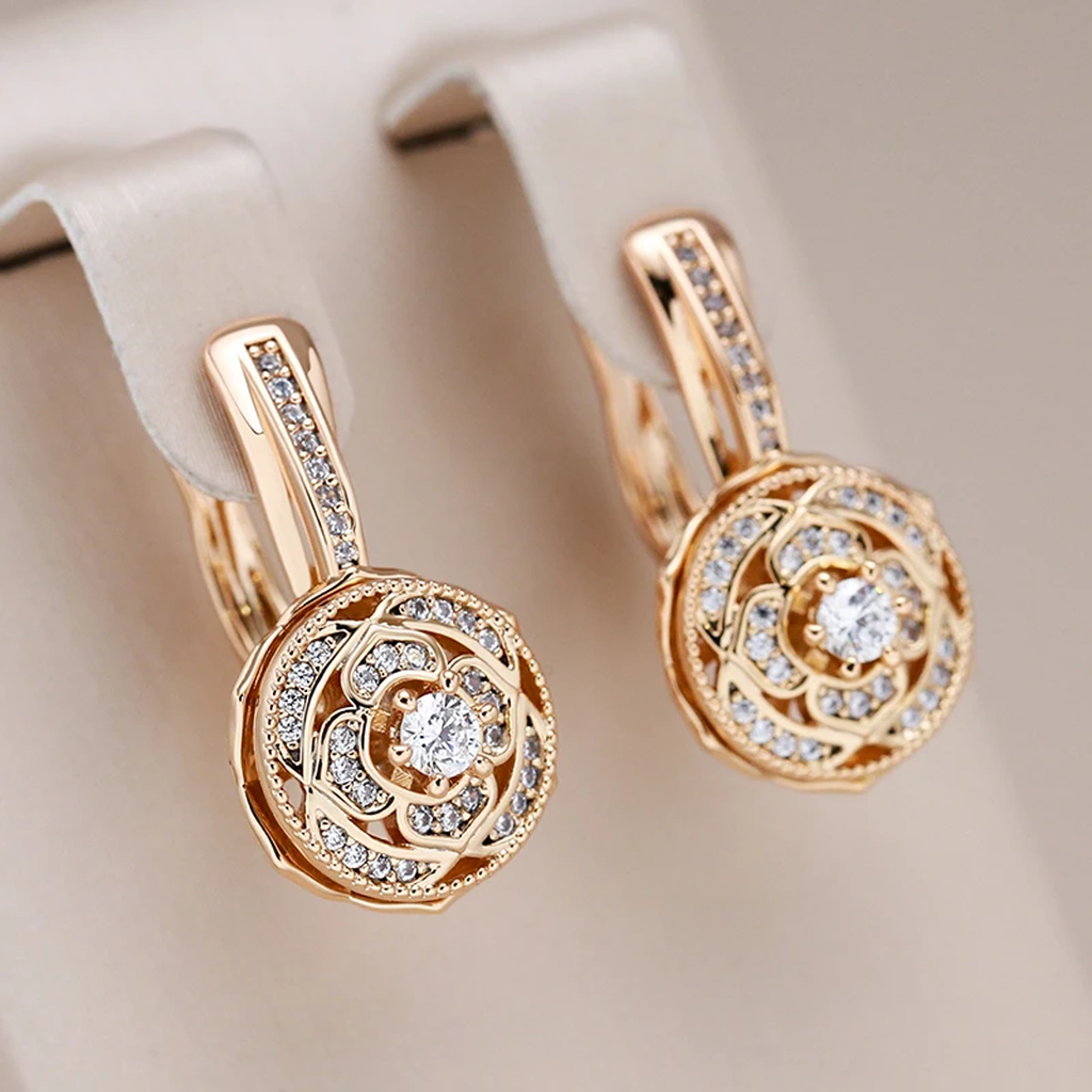 Boucles d’oreilles rondes élégantes dorées à zircons