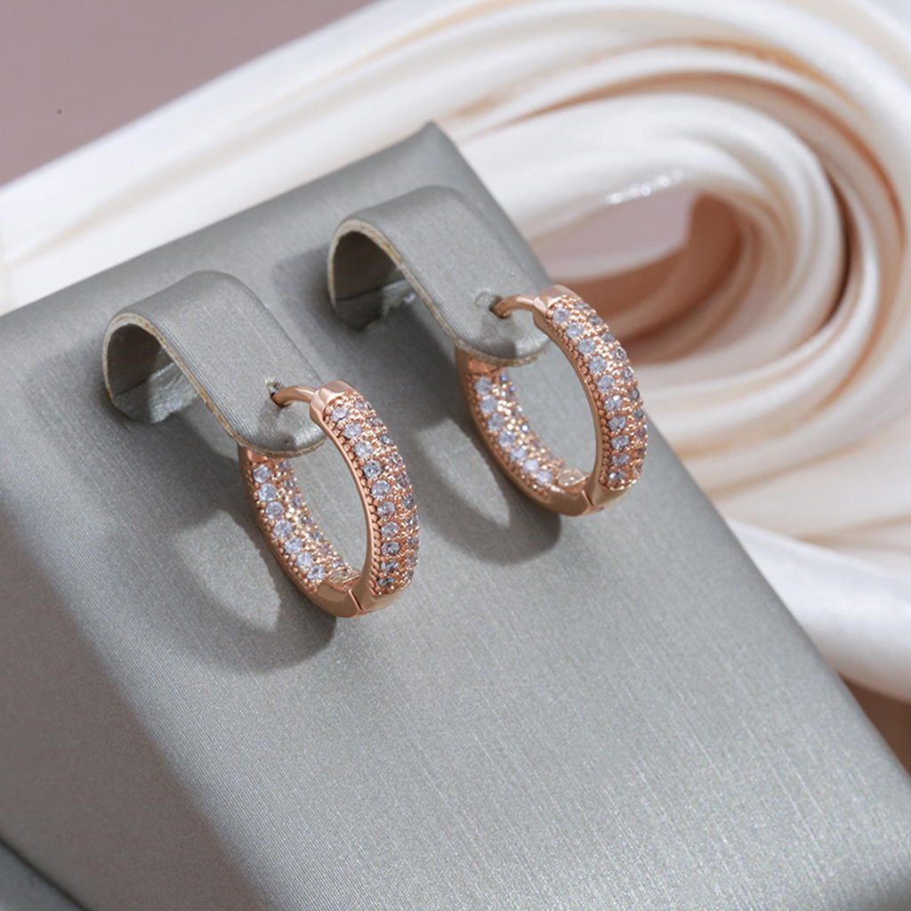 Boucles d’oreilles élégantes dorées à zircons scintillants