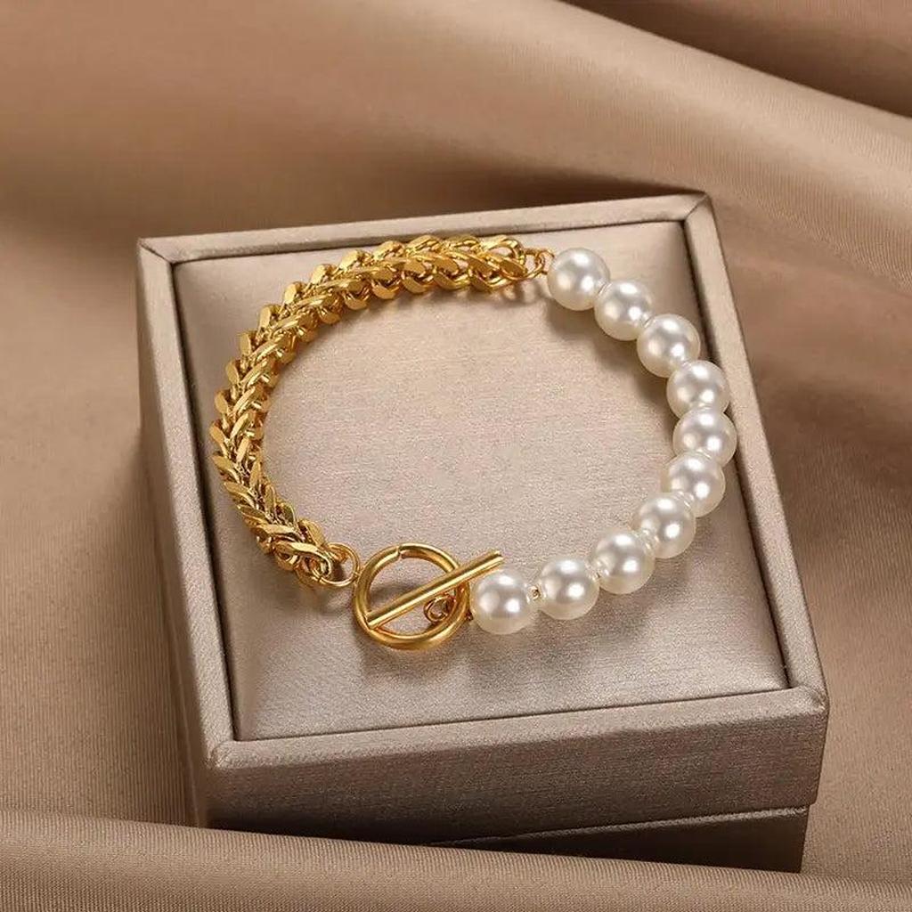 Bracelet doré élégant à marguerites