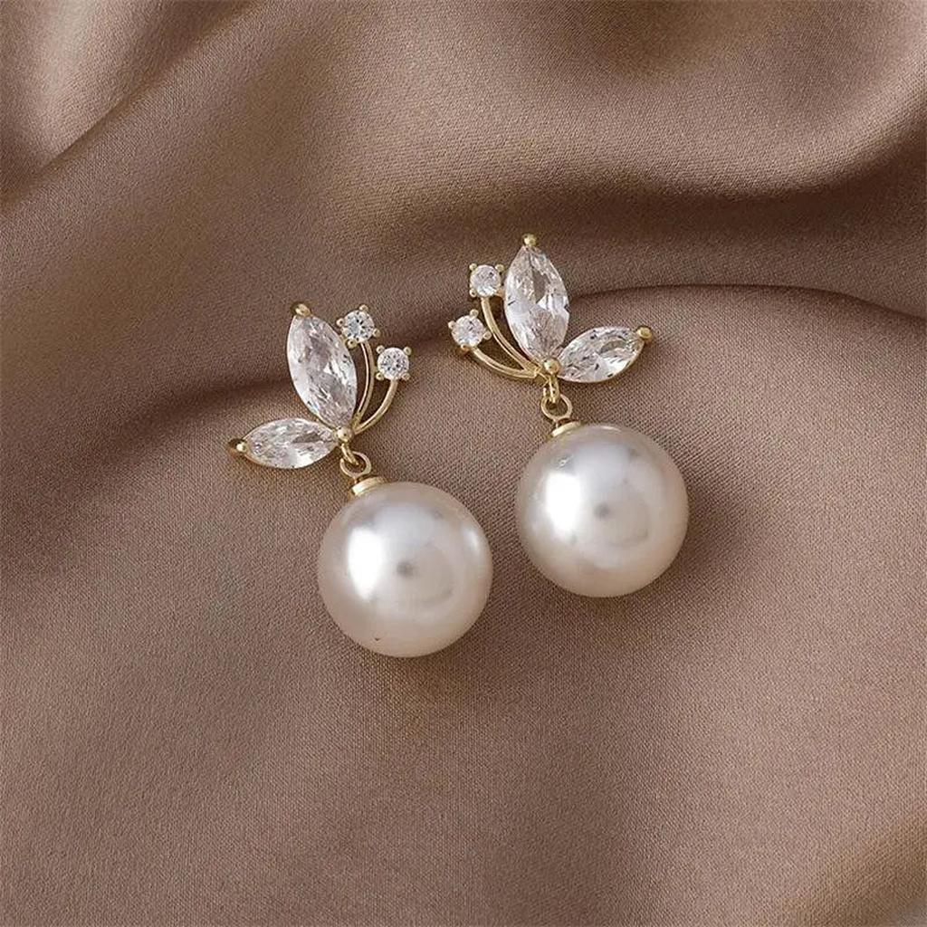 Boucles d’oreilles exotiques à marguerites et cristaux dorés