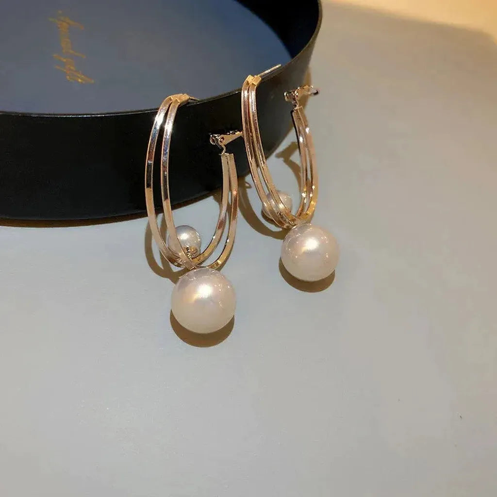 Boucles d’oreilles élégantes à perles