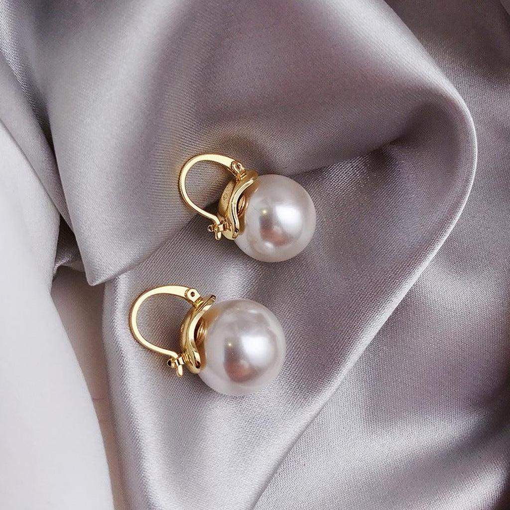 Grandes boucles d’oreilles dorées à marguerites