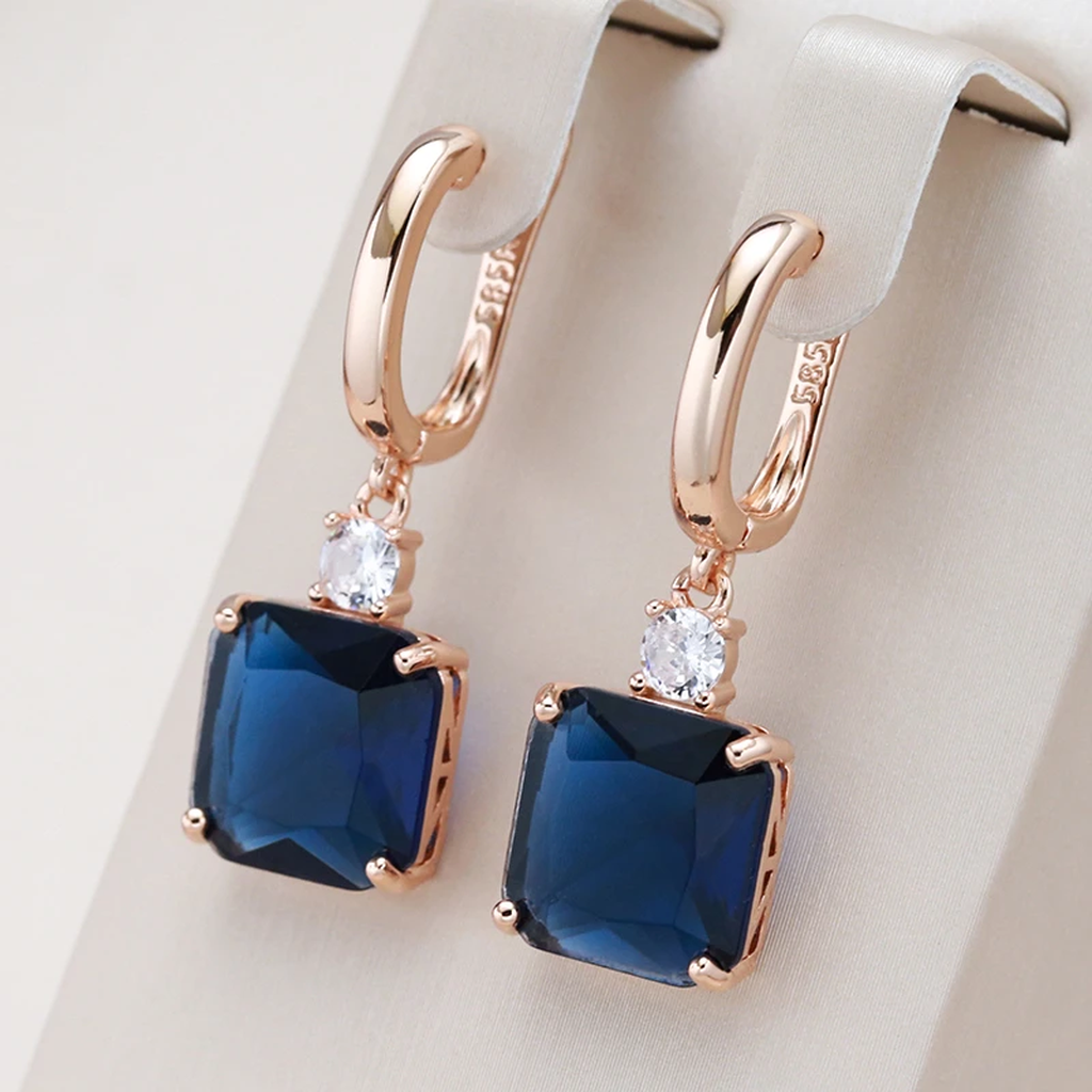 Boucles d’oreilles pendantes à cristal bleu foncé