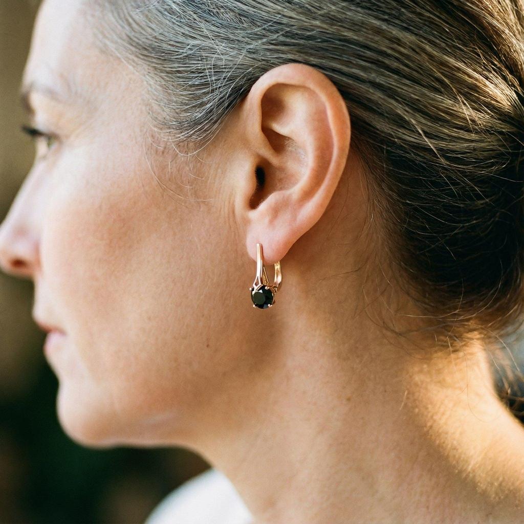 Boucles d’oreilles pendantes à zircons noirs | Doré