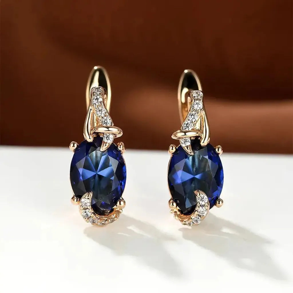 Boucles d’oreilles royales Minuit, dorées