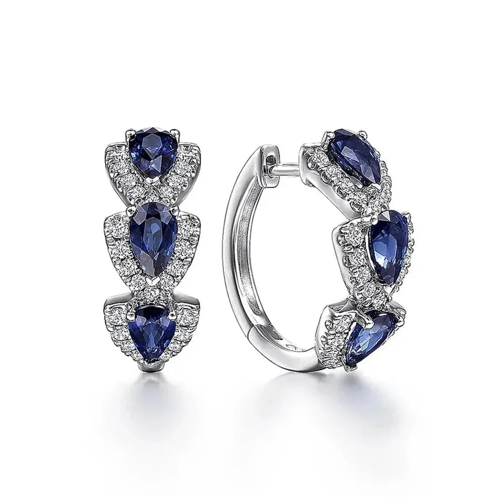 Boucles d’oreilles royales à blason et pierres bleues