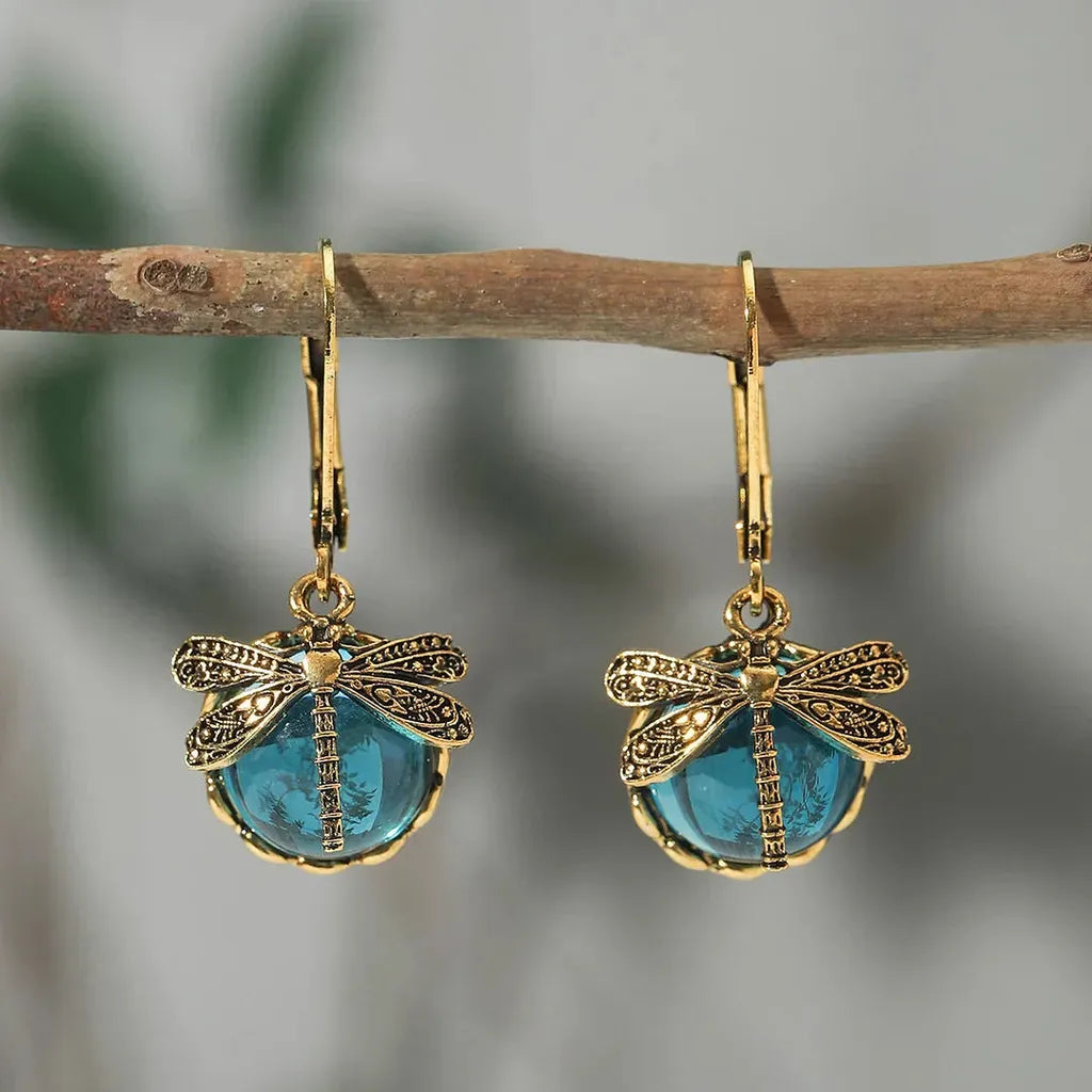 Boucles d’oreilles rondes effet or blanc vieilli