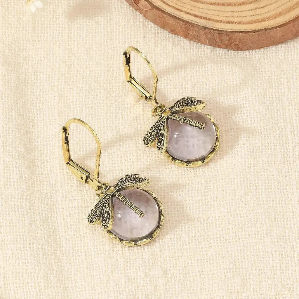 Boucles d’oreilles rondes effet or blanc vieilli