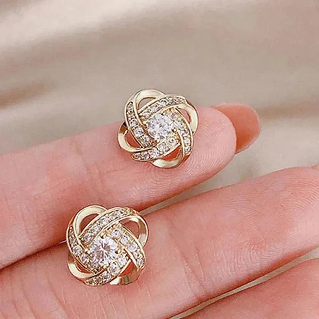 Boucles d’oreilles croix à motif floral