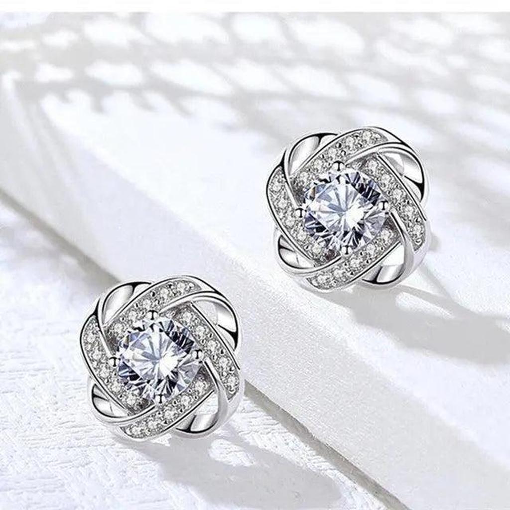 Boucles d’oreilles croix à motif floral
