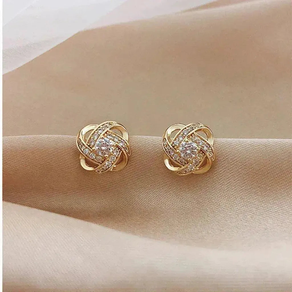 Boucles d’oreilles croix à motif floral