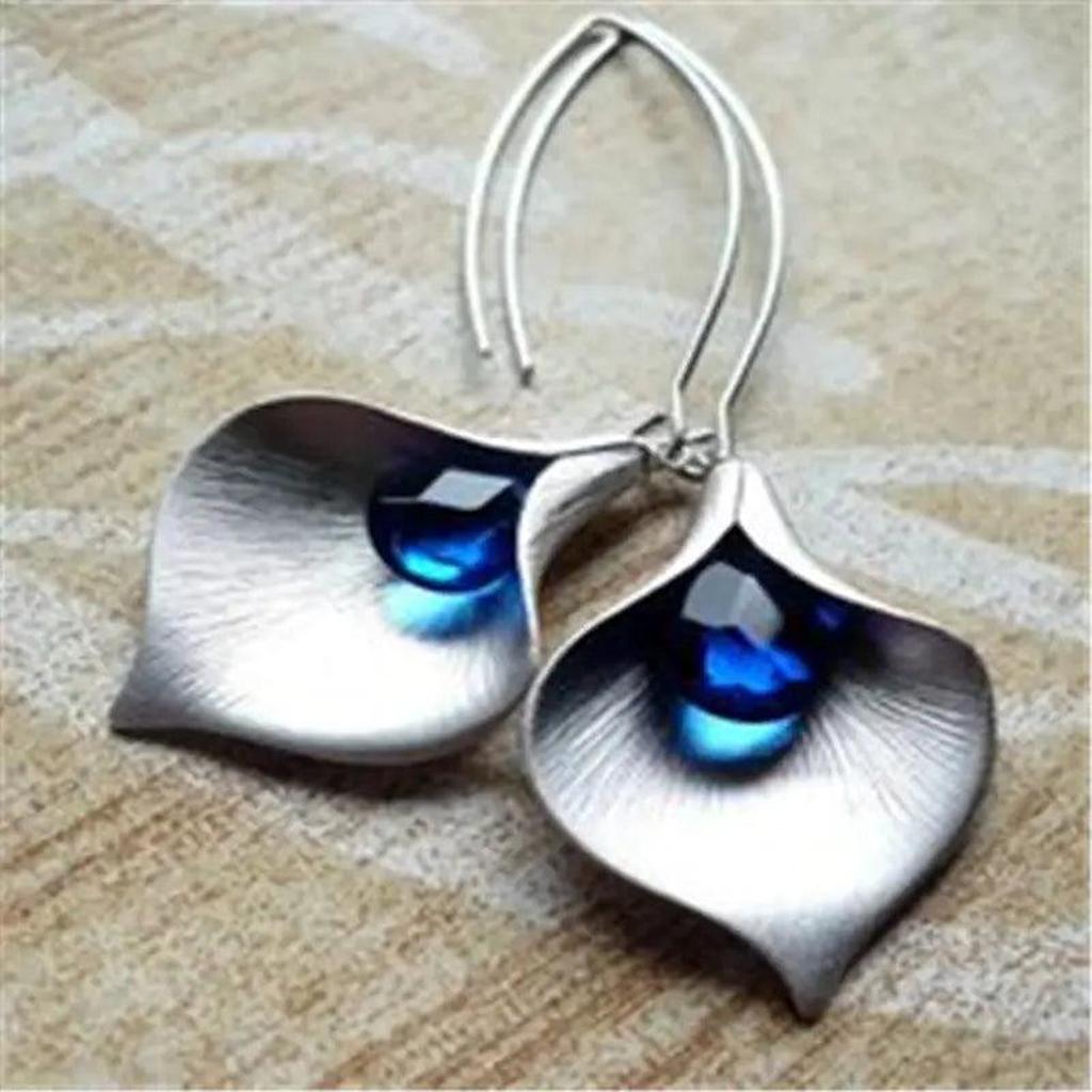 Boucles d’oreilles lotus, effet or blanc