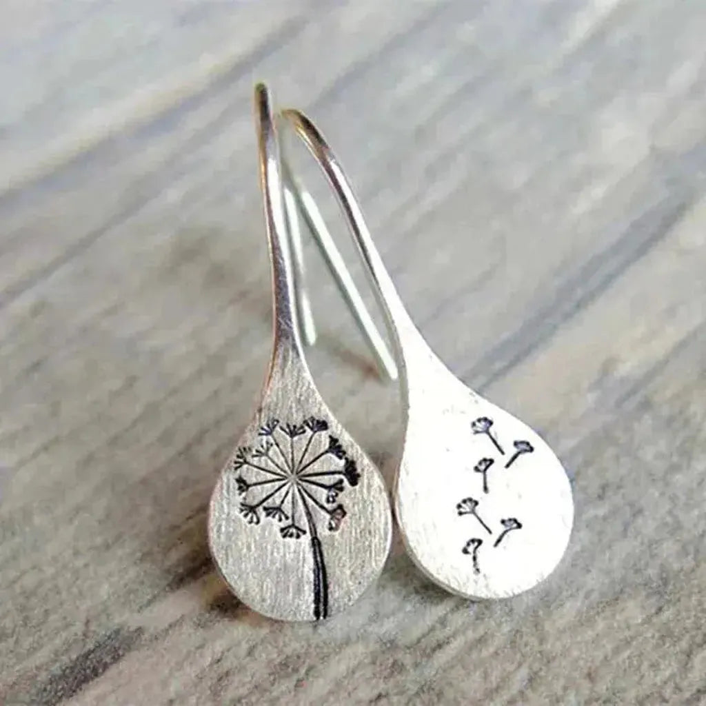 Boucles d’oreilles à motif dentelle, effet or blanc