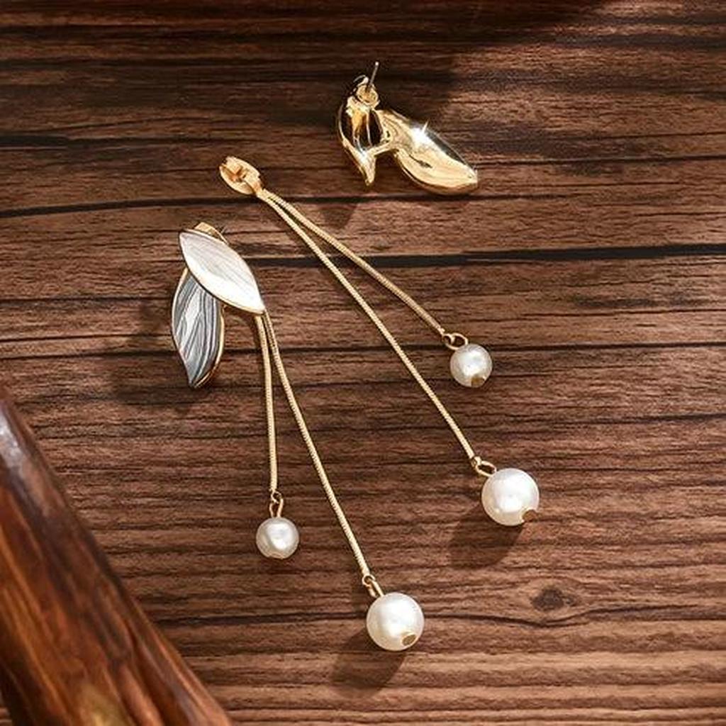 Boucles d’oreilles en forme de feuille à marguerites