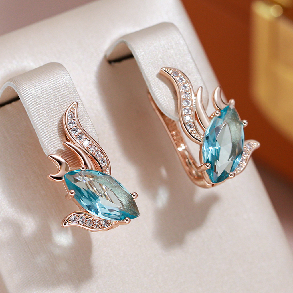 Boucles d’oreilles dorées à cristaux turquoise