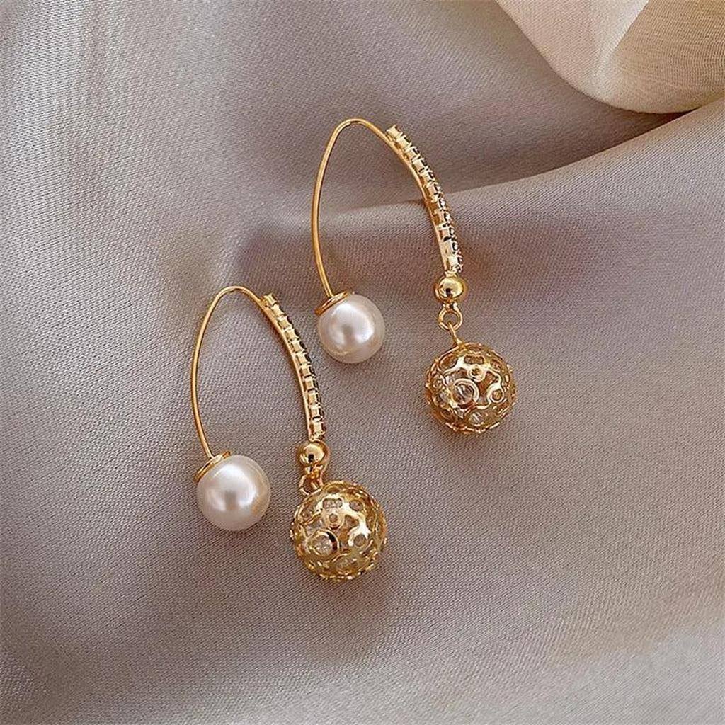 Boucles d’oreilles pendantes rétro à marguerites dorées