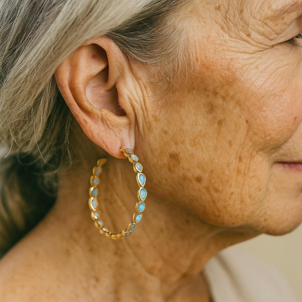 Boucles d’oreilles rétro dorées à opale bleue