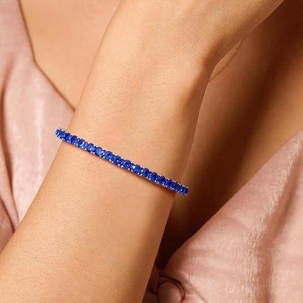 Bracelet tennis argenté à pierres bleu saphir