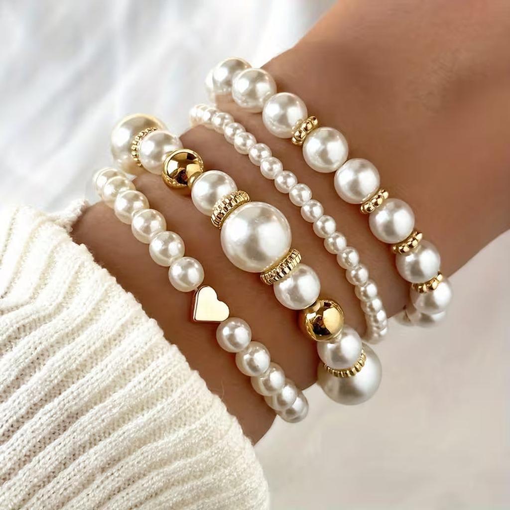 Lot de bracelets à perles blanches