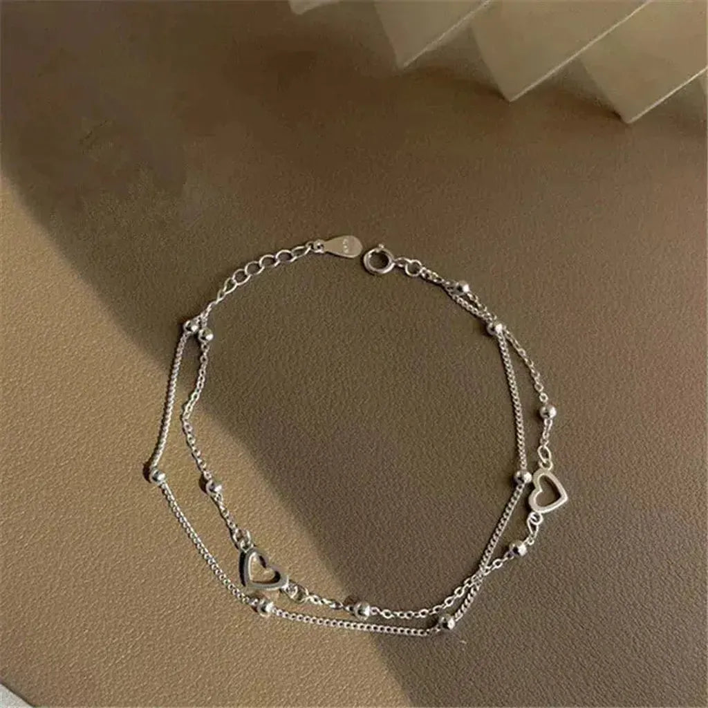 Verstellbares Weißgold-Armband mit Herz
