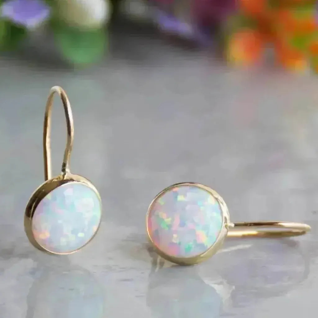 Boucles d’oreilles vintage dorées à effet opale